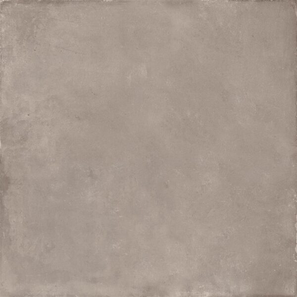 Albendo, vloeren specialist - Een close-up van de Vloertegel / Wandtegel Cloud Taupe 90x90cm tegel, die het effen, gestructureerde oppervlak in gedempt taupe laat zien met subtiele schaduwvariaties en een licht versleten, steenachtige uitstraling.