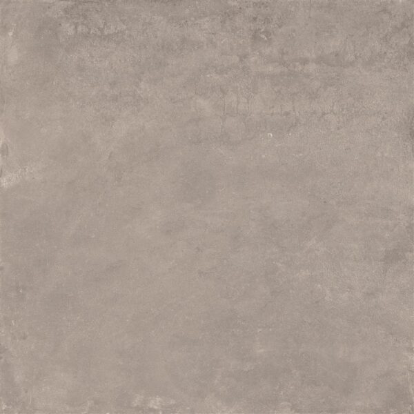 Albendo, vloeren specialist - Een close-up van de Vloertegel / Wandtegel Cloud Taupe 90x90cm toont het ruwe, getextureerde lichtbruine oppervlak met subtiele variaties in kleur en schaduw.
