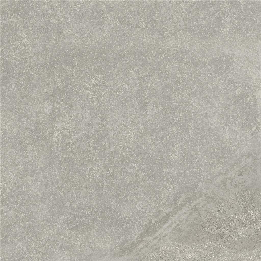 Albendo, vloeren specialist - Een close-up van de Vloertegel / Wandtegel Mainz Argento 90x90cm toont de lichtgrijze betonstructuur, subtiele kleurvariaties en een vage diagonale streep in de rechterbenedenhoek.