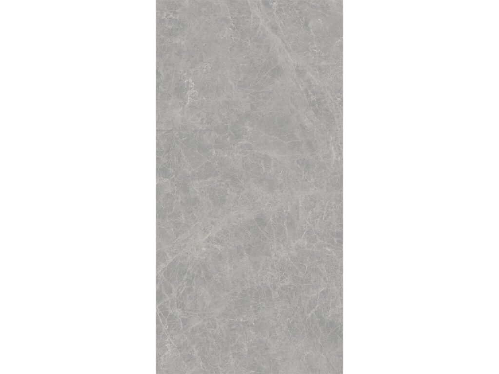Albendo, vloeren specialist - De Kale Elegant Grey 60x120cm tegel heeft een rechthoekige vorm, een grijze kleur met een subtiel gemarmerd patroon en fijne witte aders. Het gladde, uniforme oppervlak is ideaal voor gebruik als vloer- en wandtegel.