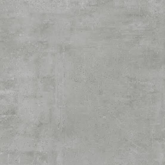 Albendo, vloeren specialist - De Vloertegel / Wandtegel Kale Fabbrica Antraciet 80x80cm heeft een gladde, lichtgrijze betonlook met subtiele textuur en vage onregelmatige markeringen, en biedt een uniforme, industriële, minimalistische stijl voor je ruimte.